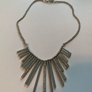 Elegant Silver Bar Necklace with Crystal Accents possibly Jennifer Lopez Brand